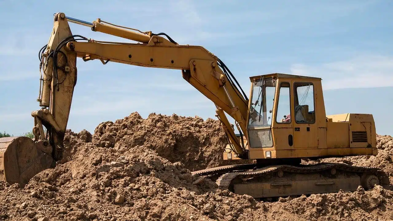 Excavator working at a construction site, representing the type of off-road diesel equipment increasingly run on B100 biodiesel (RME) for its biodegradability and lower spill risk